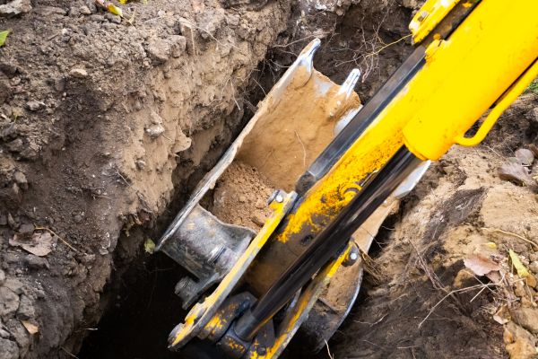 Downspout Trenching in Manchester